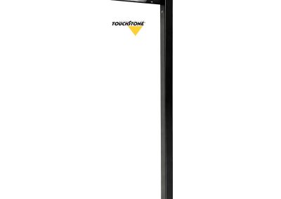 The Loo Series outdoor bollard light features a sleek black metal rectangular design with an LED panel under the top and the "TOUCHSTONE" logo in black and yellow—ideal for stylishly lighting your loo path.