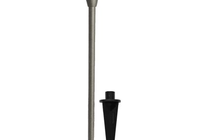 The Commander is a metal outdoor pathway light featuring a conical shade and comes with a separate black ground stake for easy installation.