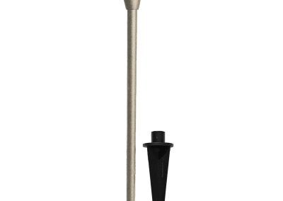The Commander is a metallic outdoor path light featuring a conical shade and includes a separate black plastic ground stake.