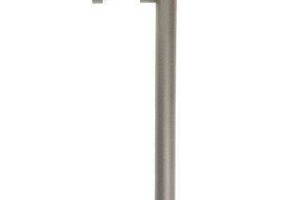 The Tubelle is a metal outdoor path light with an L-shaped design and a horizontal light source at the top.