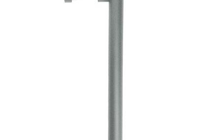The Tubelle is a gray metal outdoor bollard light with an L-shaped design and a horizontal light source at the top.