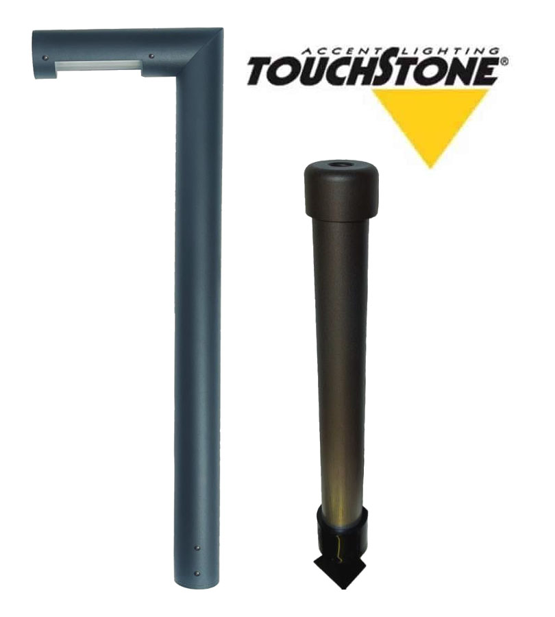 Two accent lighting fixtures are displayed: the left is L-shaped and metallic, while the right is a cylindrical model called Tubelle with a base. The Touchstone logo appears in the background.